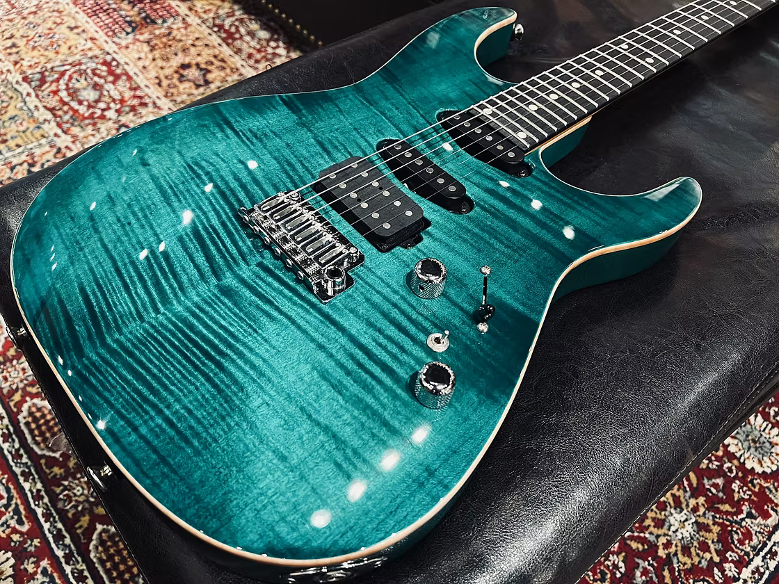 Tom Anderson Angel in Transparent Teal Burst with Binding