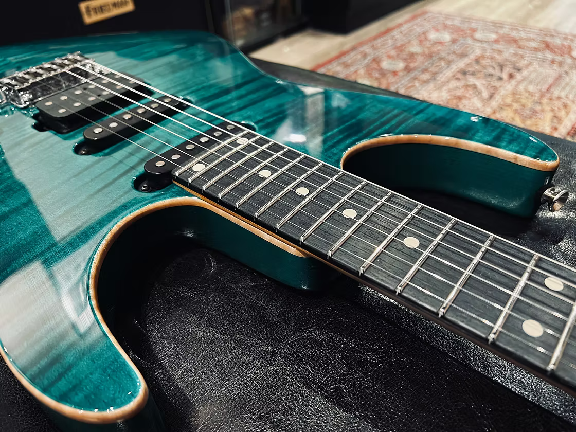 Tom Anderson Angel in Transparent Teal Burst with Binding
