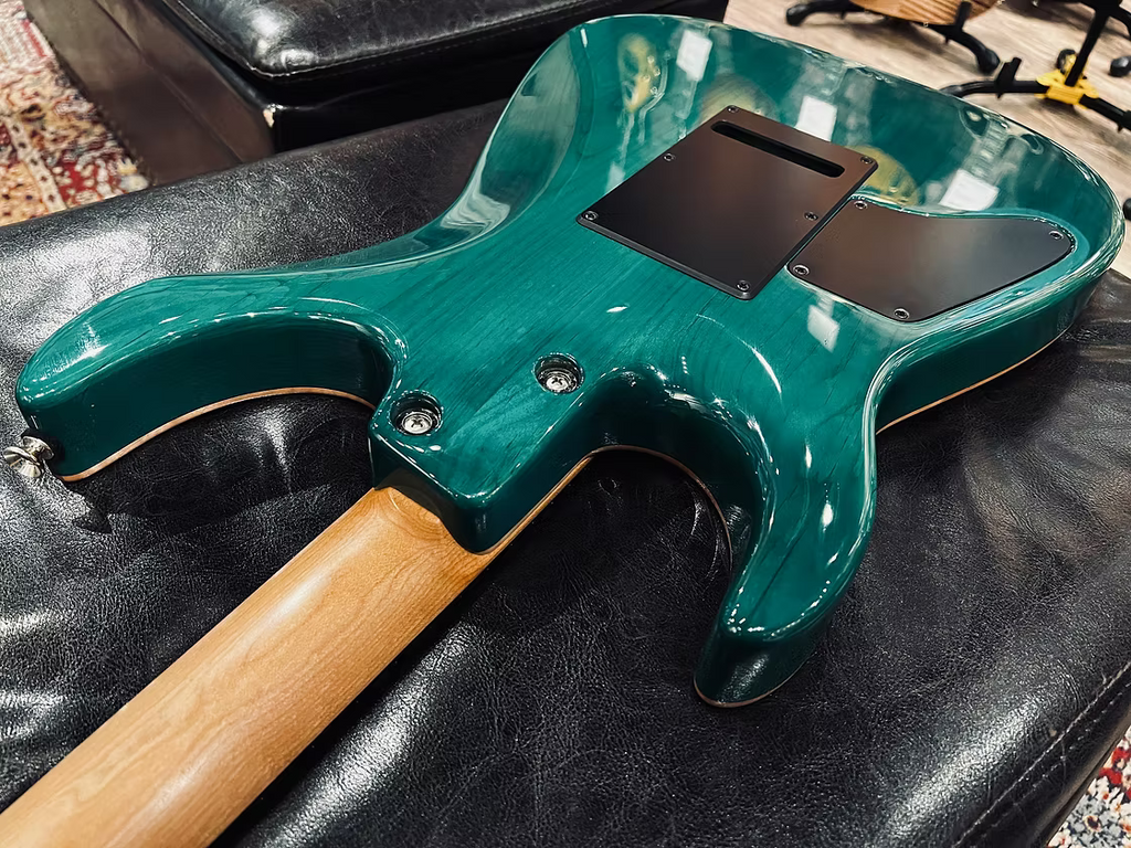 Tom Anderson Angel in Transparent Teal Burst with Binding