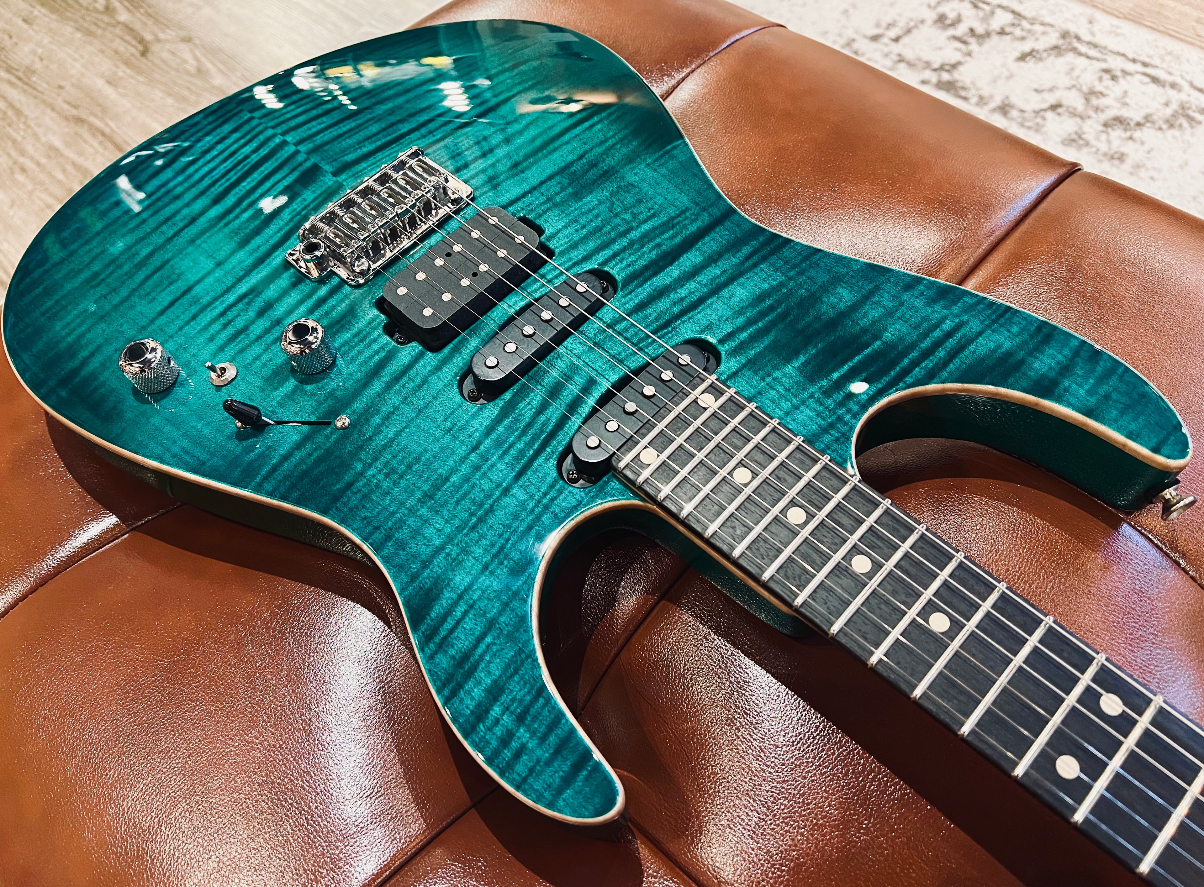Tom Anderson Angel in Transparent Teal Burst with Binding