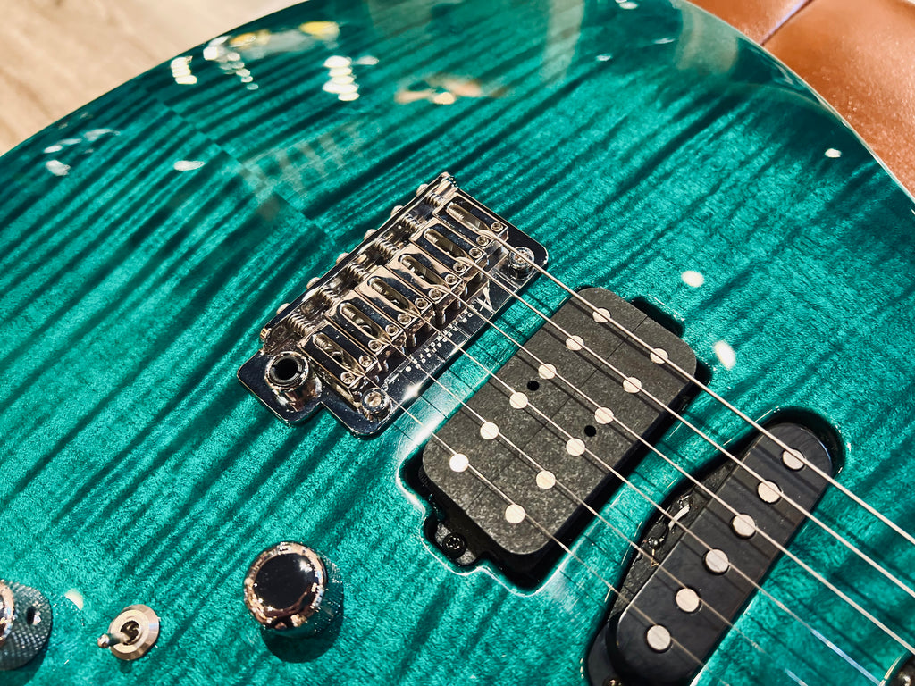 Tom Anderson Angel in Transparent Teal Burst with Binding
