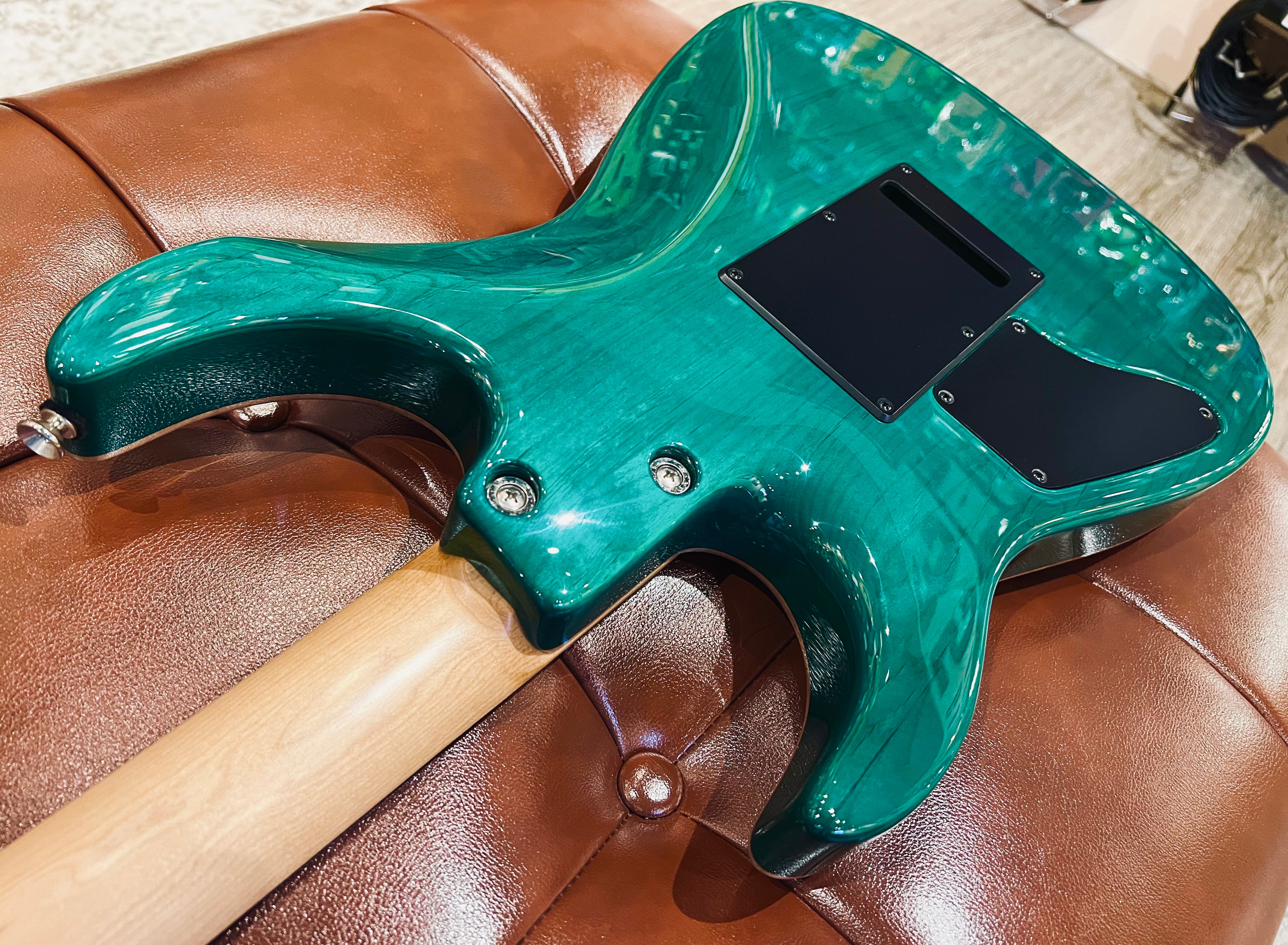 Tom Anderson Angel in Transparent Teal Burst with Binding